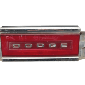 1988 - 1993 DODGE DYNASTY REAR CENTER TAIL LIGHT FINISH PANEL OEM, 194-00121