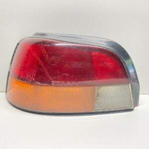 1991 - 1992 GEO STORM REAR LEFT DRIVER SIDE TAIL LIGHT LAMP OEM, 166-58516