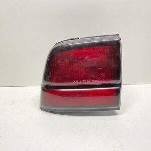 91-94 CHEVROLET CAVALIER LEFT SIDE QTR PANEL MOUNTED TAIL LIGHT OEM, 166-01430