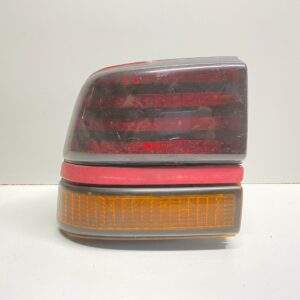 1988 - 1991 PONTIAC SUNBIRD REAR LEFT SIDE TAIL LIGHT QTR MOUNTED OEM 166-01340