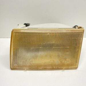 1989 - 1994 LINCOLN CONTINENTAL FRONT LEFT DRIVER SIDE HEADLIGHT OEM, 114-00107