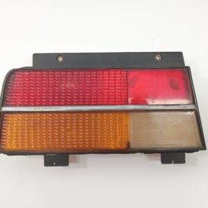 1982 - 1987 CHEVROLET CAVALIER DRIVER LEFT SIDE TAIL LIGHT OEM, 166-01072BL