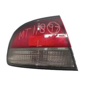 1997-1998 MITSUBISHI GALANT REAR LEFT SIDE TAIL LIGHT QTR MOUNTED OEM, 166-58882